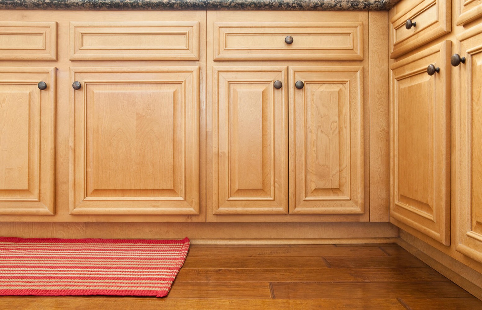 8 Proven Ways to Clean Sticky Wood Kitchen Cabinets  LoveToKnow - wood kitchen units